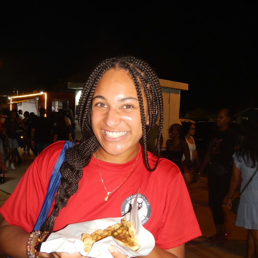 Ruby Codrington smiling in an ensemble shirt